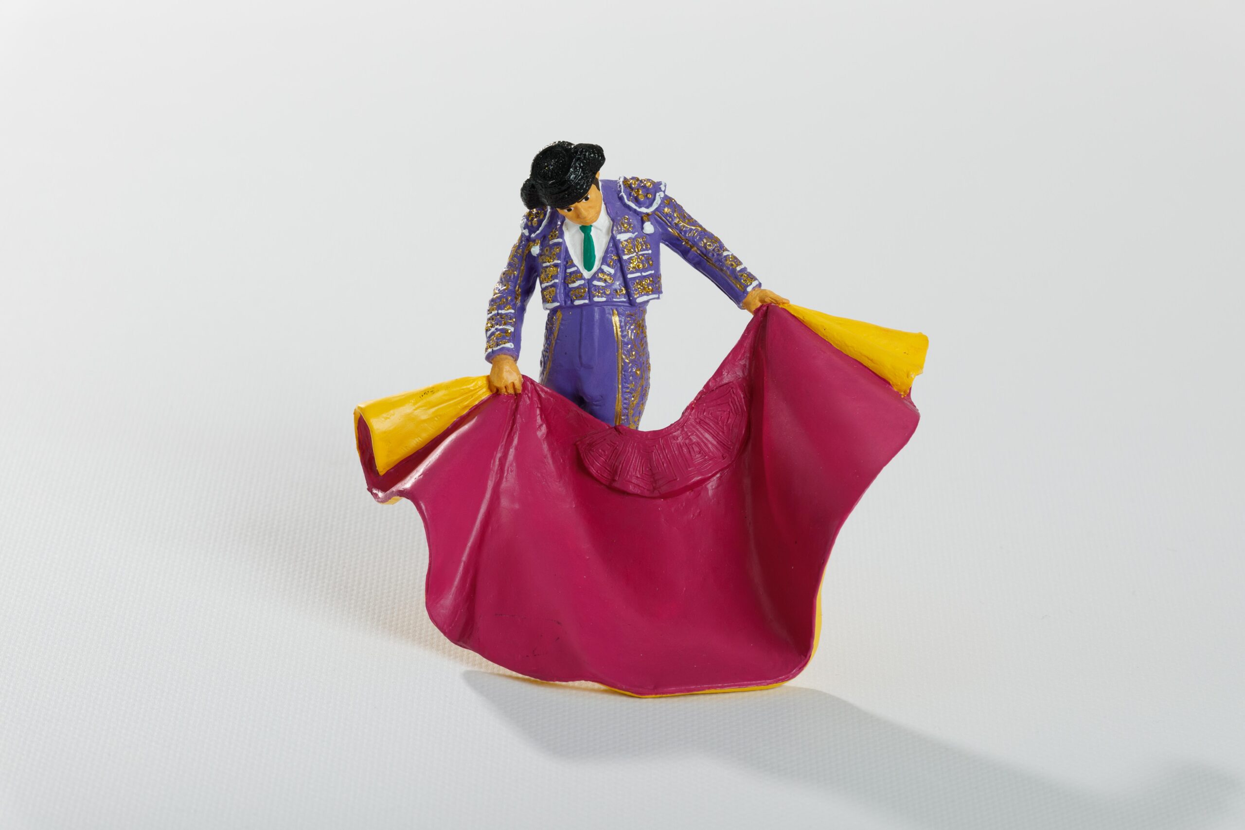 colorante Paquete o empaquetar pantalones Torero con Capote Malva y Oro - Miniaturas y Juguetes taurinos hechos a  mano | coleccionismo España